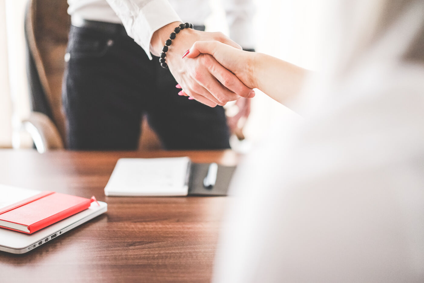 Cyberdata Technology consultant shaking hands with a client